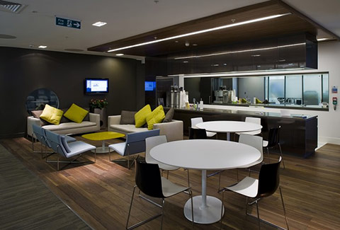 a photo of a modern sophisticated breakout area for relaxed business