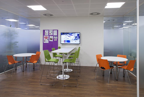 a photo of a clean and modern office breakout area