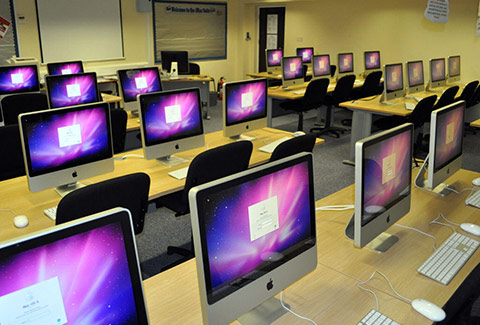 a photo showing specialist computer training area in a school - view from rear